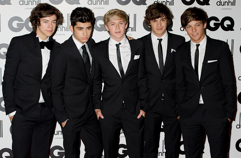 Liam Payne (dua, kanan) bersama ahli kumpulan One Direction yang lain, Harry Styles, Zayn Malik, Niall Horan dan Liam Tomlinson pada majlis GQ Men of the Year Awards di London, 6 Sept 2011. - Gambar fail/AP