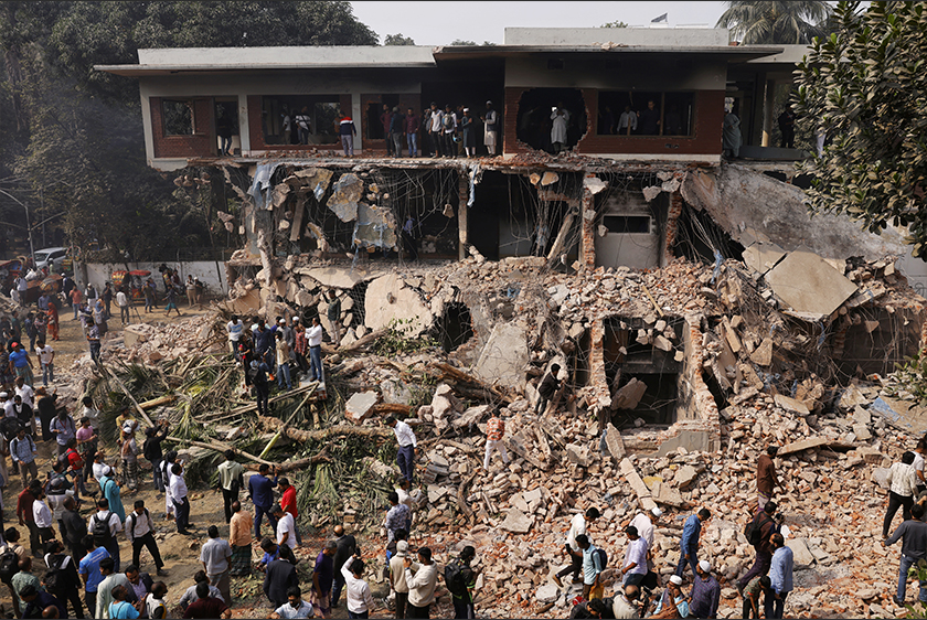 Protesters and people gather to see the demolished Dhanmondi-32 residence of Bangabandhu Sheikh Mujibur Rahman, father of the ousted PM Sheikh Hasina, in Dhaka, Bangladesh February 6, 2025. - REUTERS