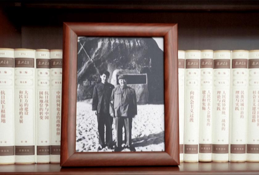 Filepic shows Xi Jinping, his father on bookshelf in Xi Jinping's office, Beijing, China - Dec 31, 2022. - CCTV/via REUTERS