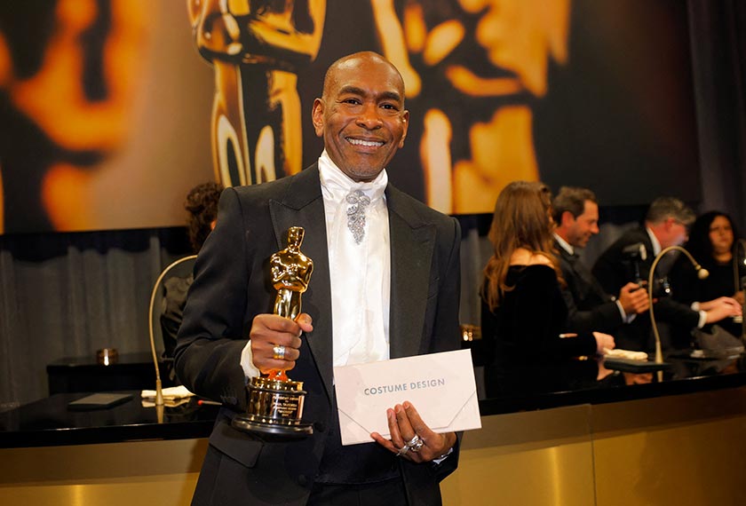 Paul Tazewell poses with the Oscar for Best Costume Design for