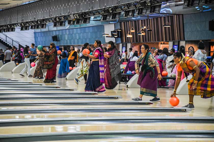 Grace meets game! Women showcase elegance and skill as they bowl in vibrant sarees, Sunway Mega Lanes, Sunway Pyramid, March 8, 2025. Credit: Moganraj Villavan