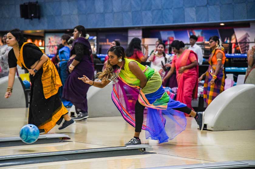 Blending tradition with sport, the ladies take to the lanes in sarees for a unique bowling challenge, Sunway Mega Lanes, Sunway Pyramid, March 8, 2025. Credit: Moganraj Villavan