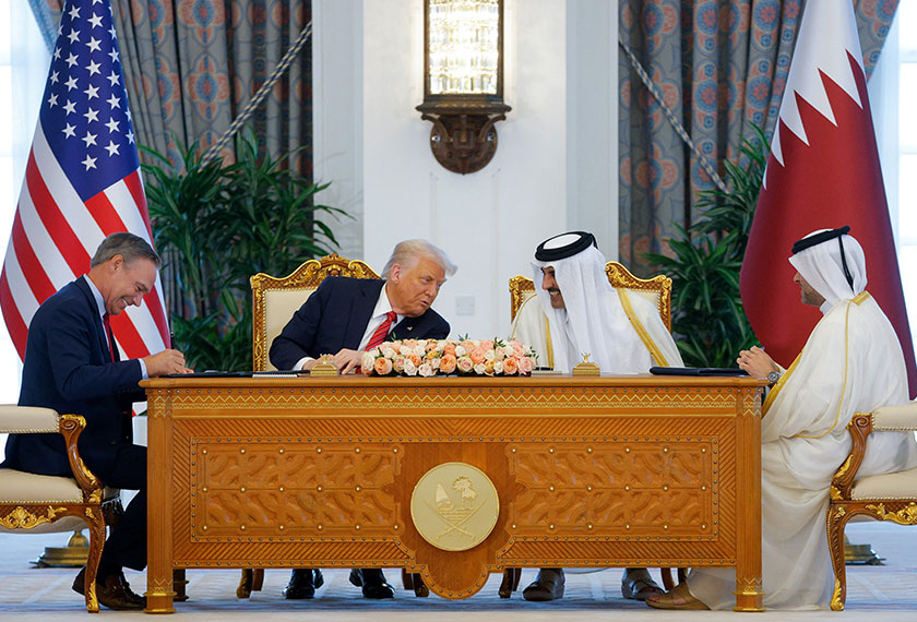 Trump, Qatar's Emir Tamim Hamad Al Thani and Boeing CEO Kelly Ortberg at a signing ceremony in Doha. - REUTERS