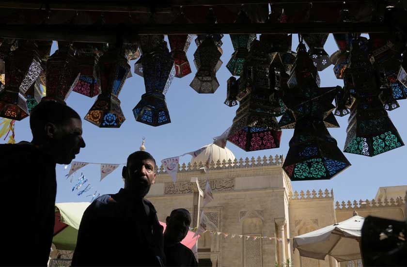 People buy traditional lanterns in Sayyeda Zeinab market ahead of the upcoming Muslim fasting month of Ramadan, in Cairo, Egypt, Tuesday, Feb. 17, 2026. (AP Photo/Amr Nabil)