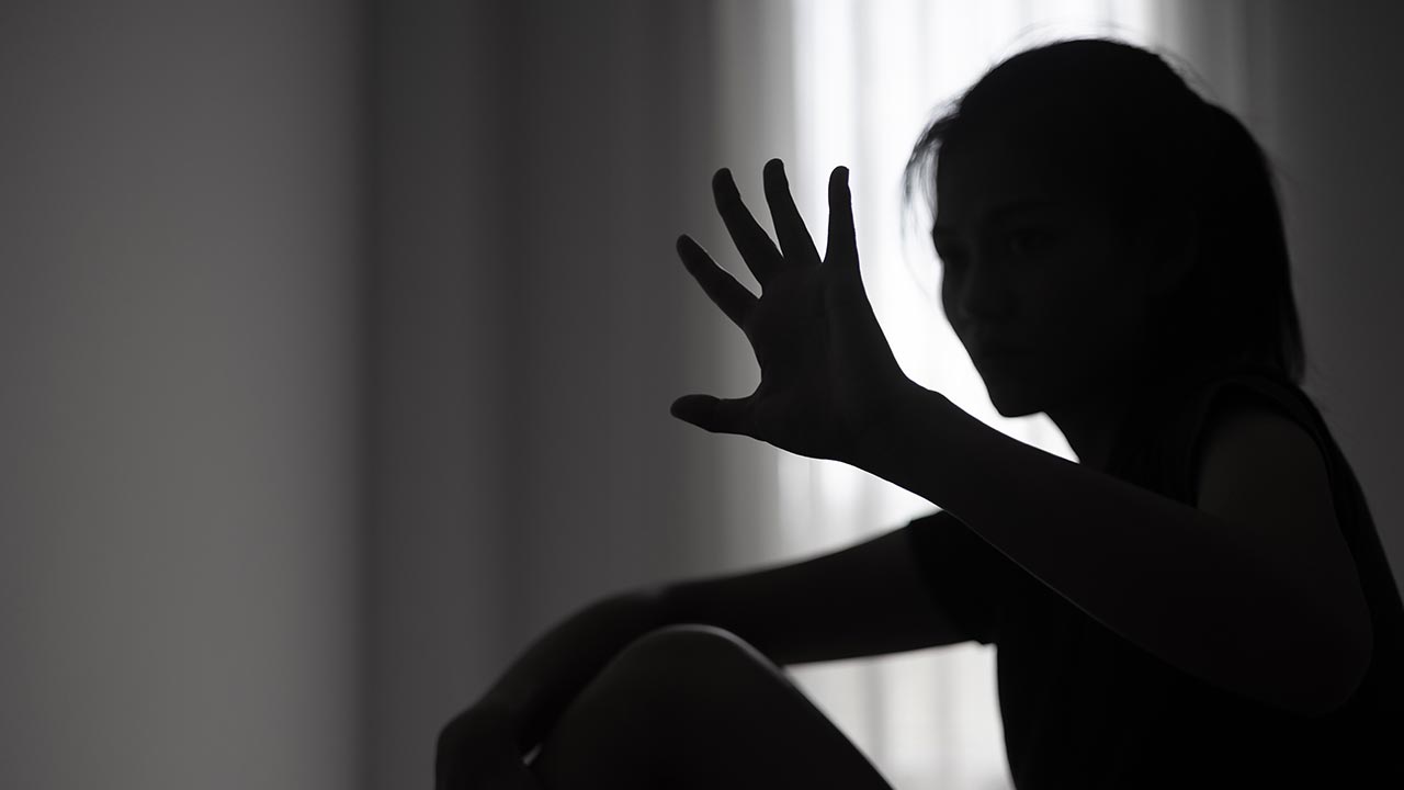 Stop sexual harassment and violence against women, rape and sexual abuse concept, STOP gesture with hand, Stop drugs, human rights violations, human trafficking, Copy space. --Adobe Stock Image