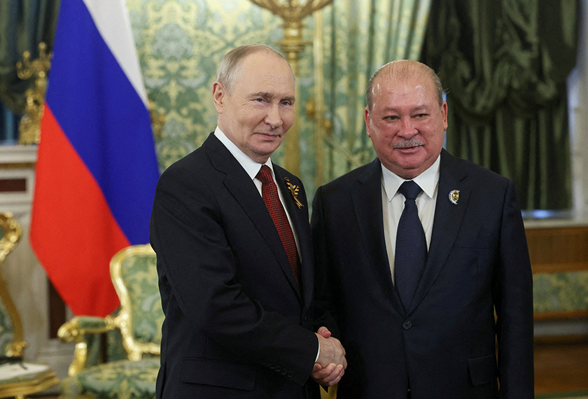 Russia's President Vladimir Putin shakes hands with Malaysia's King Sultan Ibrahim Iskandar during a meeting at the Kremlin in Moscow, Russia May 9, 2026. Maxim Shipenkov/Pool via REUTERS