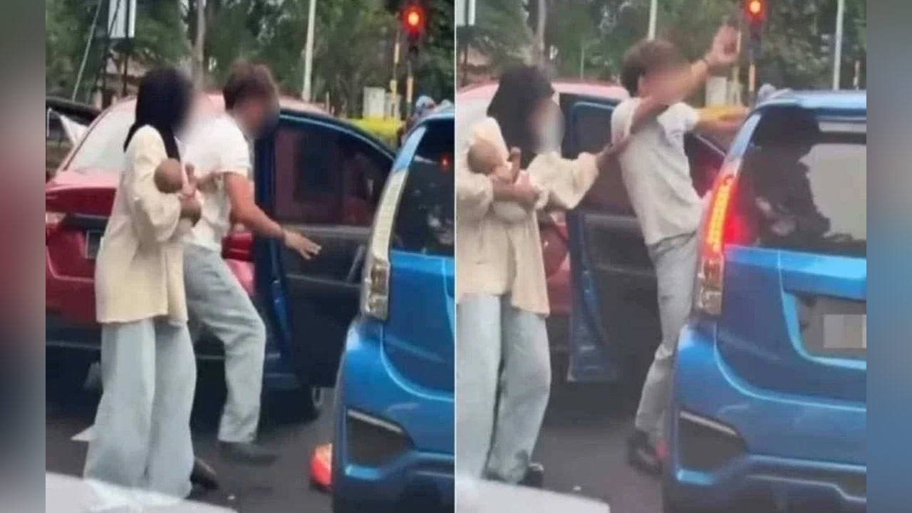 Tular lelaki mengamuk di persimpangan lampu isyarat