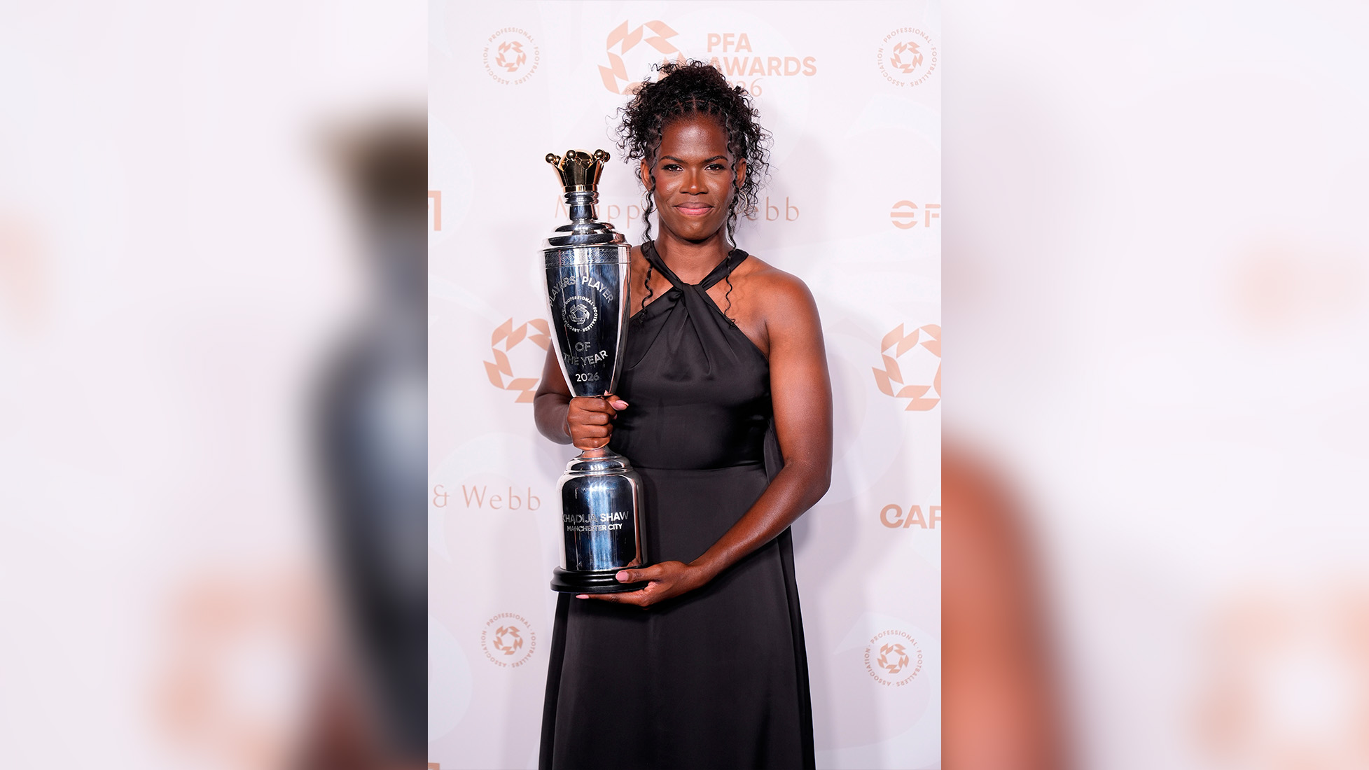 Khadija "Bunny" Shaw with her PFA players player of the year award during the PFA Awards 2026 at Manchester Opera House, Manchester, England, Tuesday Aug. 25, 2026. (Peter Byrne/PA via AP)