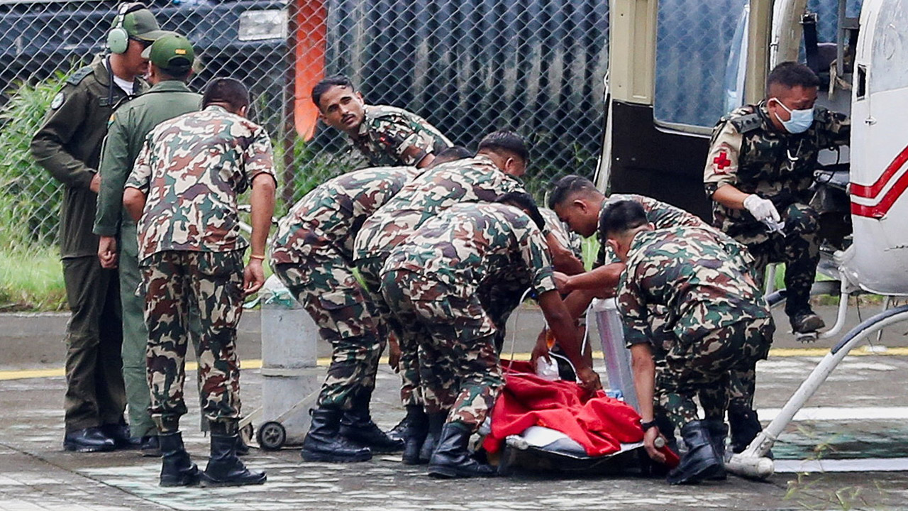 Members of the Nepal Army move a survivor, Kabir Maharjan, rescued from a tunnel at the Upper Trishuli 3A hydropower project, nine days after deadly flash floods and a mudslide, after he was airlifted from an army base in Nuwakot to Kathmandu, Nepal, Sep 4, 2026. (Photo: REUTERS/Dipen Shrestha)