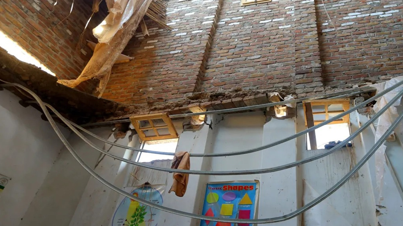 The roof crashed through three classrooms and buried schoolchildren in debris, police say/ Reuters